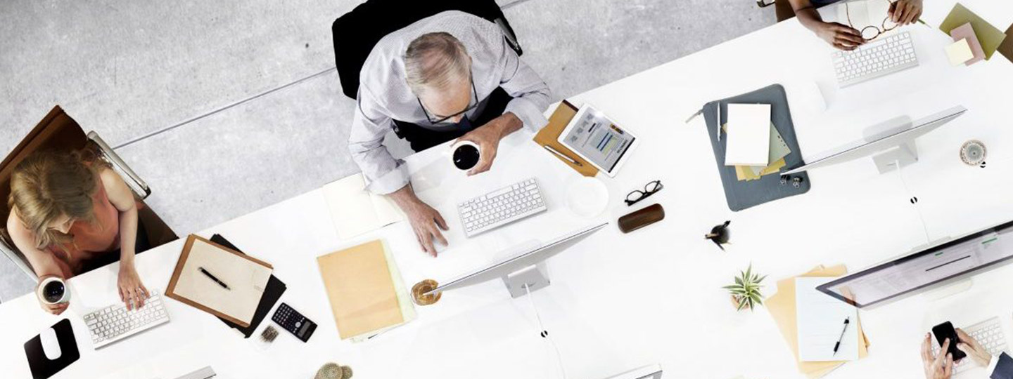 Business workers at computers